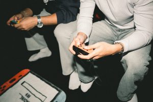 Two adults enjoying a video game session together, focused on controllers. — Top Betting Markets on Bet38: Where to Place You